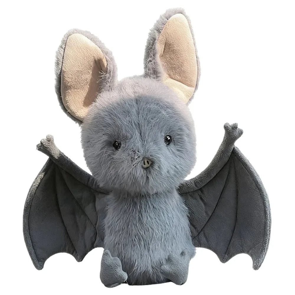 A soft grey bat plush toy with large ears and translucent wings.