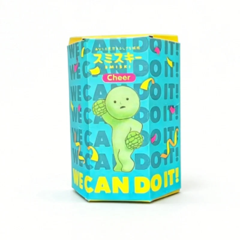 A blind box collectible featuring a green, smiling character named Cheer in a blue and yellow packaging.