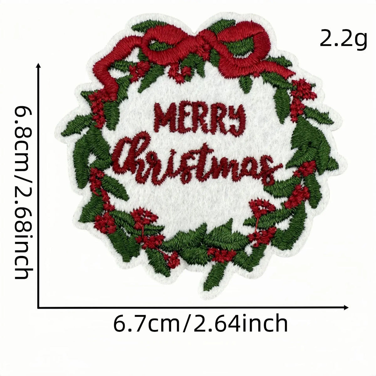 A festive iron-on patch featuring a wreath design with red ribbon and holly leaves on a white background.