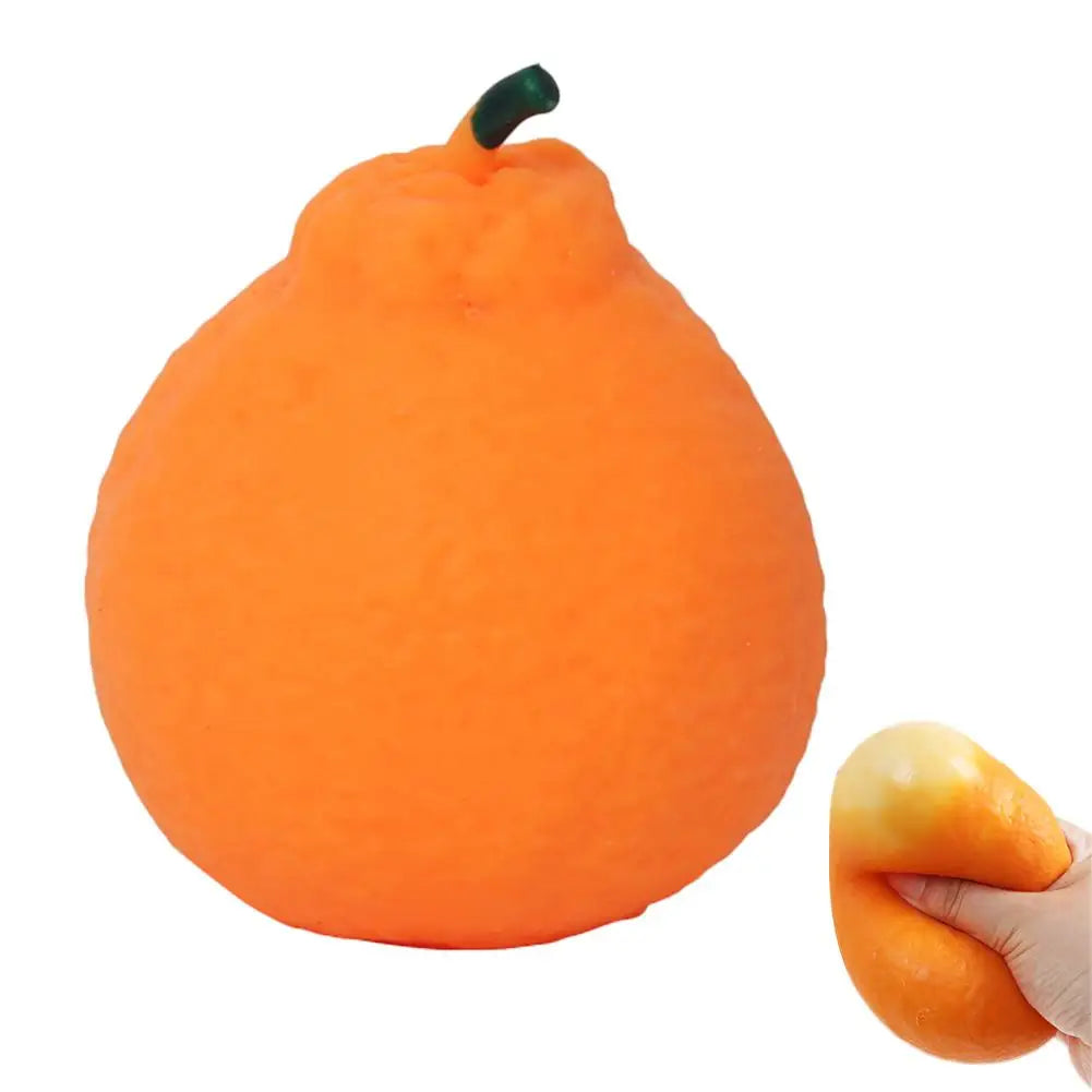 An orange stress ball with a green stem, designed for anxiety relief.