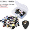 A clear plastic holder containing 100 guitar picks of various thicknesses and a leather pick holder.
