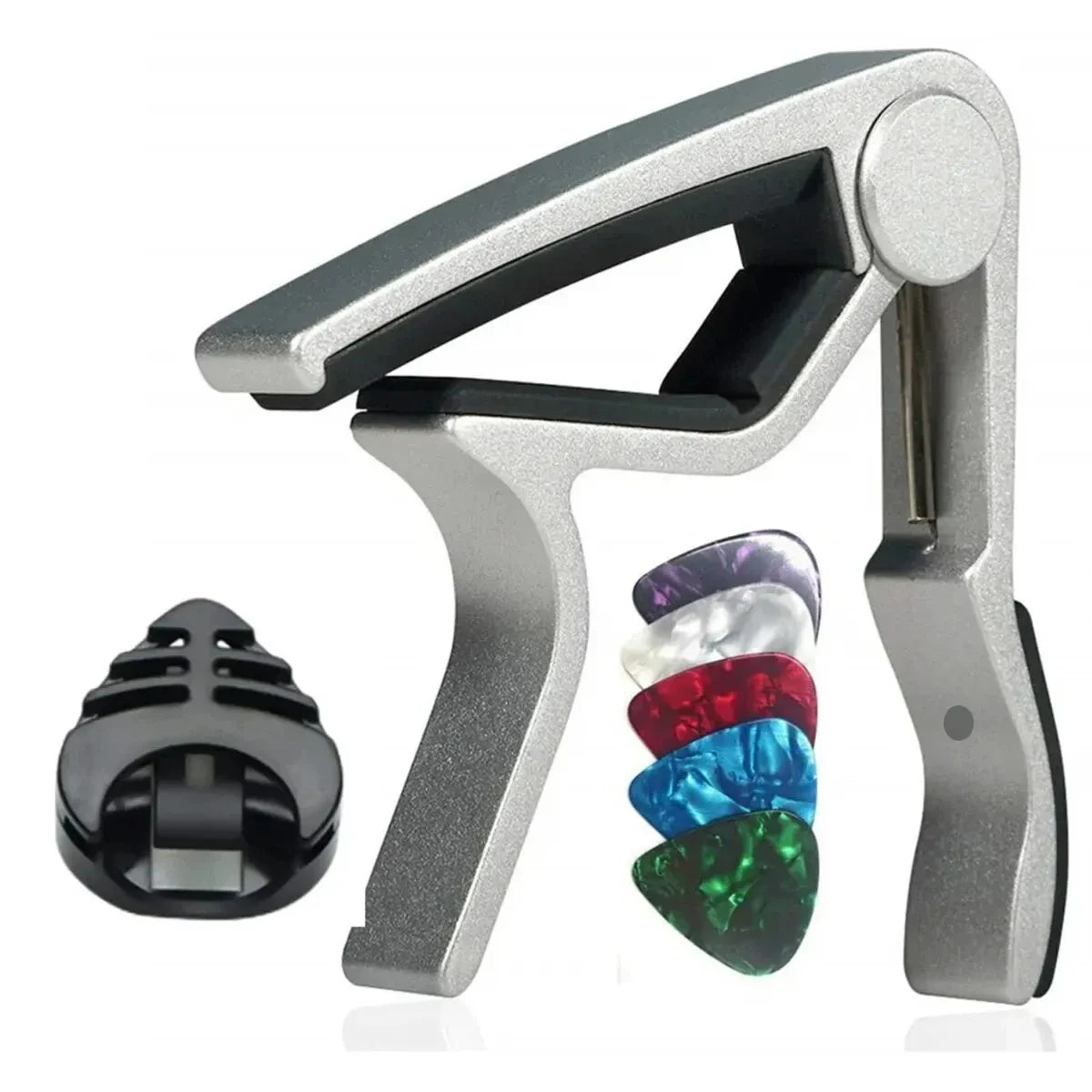 A silver guitar capo set featuring a clamp, picks, and a holder.