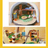 A display of air-dry stone plastic clay sculptures and crafts arranged on a wooden surface.