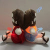 A plush toy resembling a sleeping face with soft glowing lights.