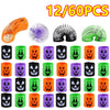 A set of 12 or 60 Halloween pumpkin coil spring toys for party favors in various colors and designs.