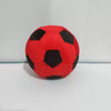 A single red and black soccer ball made of crochet is displayed against a white background.