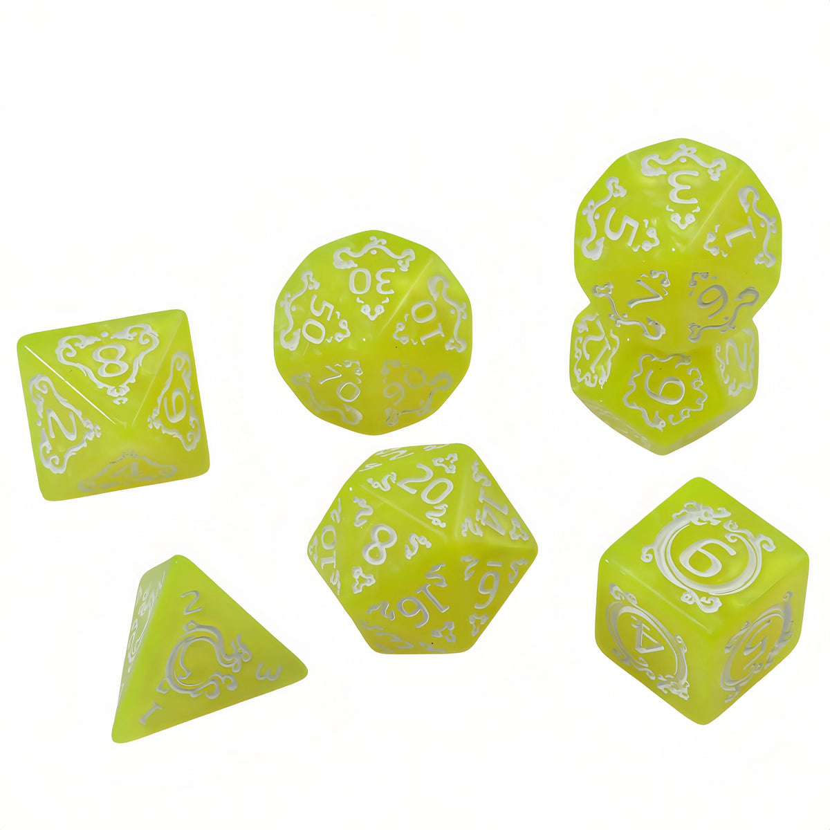 A set of yellow translucent polyhedral dice featuring dragon-inspired designs for tabletop role-playing games