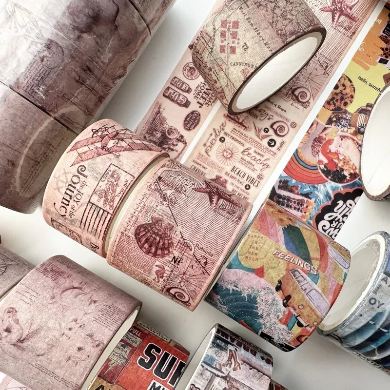 A collection of vintage patterned washi tape rolls featuring sepia tones, botanical designs, and rustic textures.