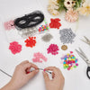 A collection of colorful beads, stringing wire, and pliers for a DIY beaded keychain making kit.