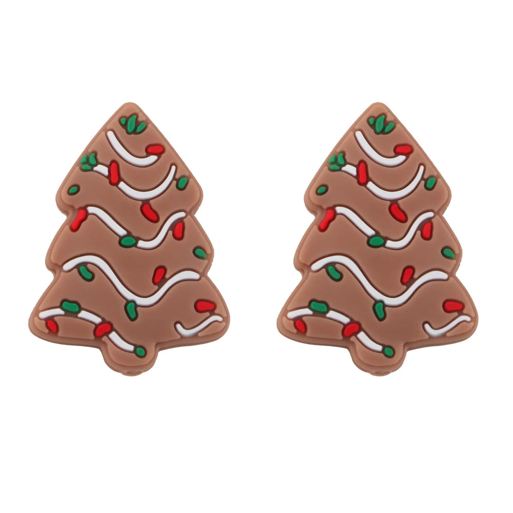 Two brown silicone Christmas tree beads decorated with red and green candy cane lines