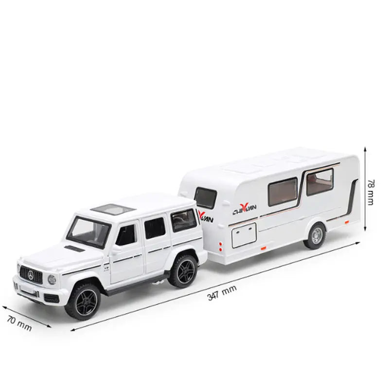 White diecast metal RV camper truck model with sound and light features shown from the side.