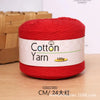 A ball of red 100% cotton yarn labeled Cotton Yarn with a 100g weight.