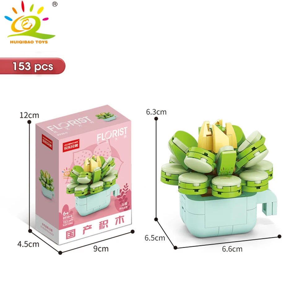 A set of 153 flower succulent building blocks in various shades of green and yellow, packaged in a pink box.