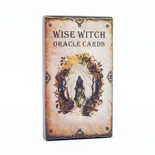 A rectangular box of Wise Witch Oracle Cards featuring an illustration of a witch standing within a leafy archway.