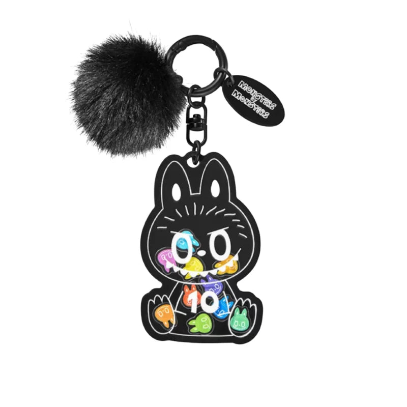 A black Labubu figurine charm with a fuzzy pom-pom and a 0.0 to 10 rating display.