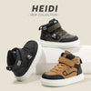 A pair of Heidi new collection high-top sneakers in olive green and black leather with white soles.