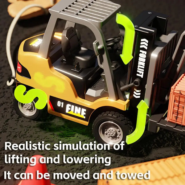 A yellow and black remote control forklift mini truck model with a green lift mechanism on a dark surface.