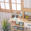 A wooden shelf displays a miniature hand-brewed coffee stand set for dollhouse with glass and ceramic items.