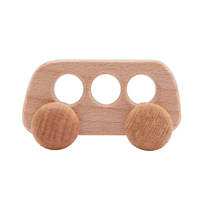 A wooden Montessori push cart toy shaped like a car or bus, made of light-colored beech wood.