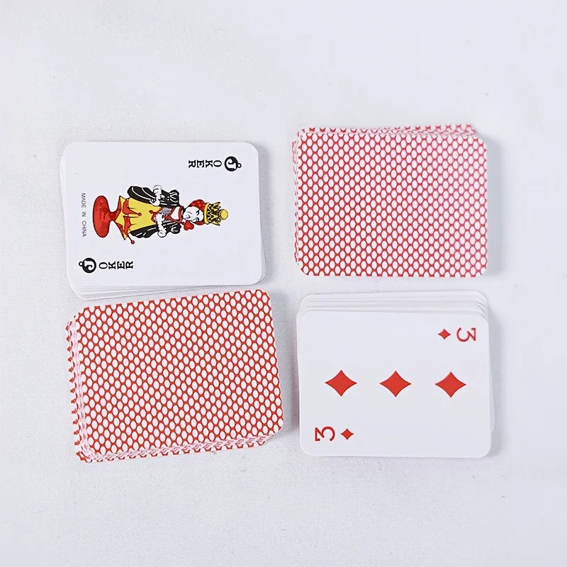 A set of portable mini playing cards featuring a red patterned cover and white cards with red diamond symbols.