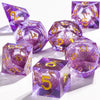 A collection of purple polyhedral dice with a galaxy finish scattered on a white surface.