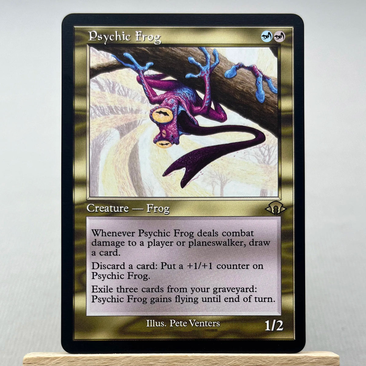 A Magic: The Gathering card named Psychic Frog featuring a purple frog creature and rules text.