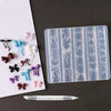 Clear silicone nail molds featuring various bowknot designs arranged in a plastic holder with a carving pen.