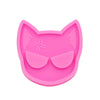 A pink silicone mold shaped like a cat head for DIY keychains and craft projects.