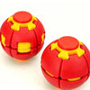 A red and yellow 3D gear ball fidget toy with a spiral design for stress relief.