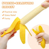 A hand is squeezing a yellow stretchy banana fidget toy for stress relief.