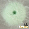 A close-up of light green long-haired alpaca blend yarn showing a central core and surrounding fibers.