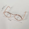 A pair of rose gold metal round glasses frames shown with dimension lines.