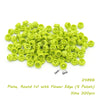 A pile of lime green round 1x1 building blocks with a flower edge.