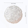 A clear, spherical fidget ball made of soft silicone, used for stress relief.
