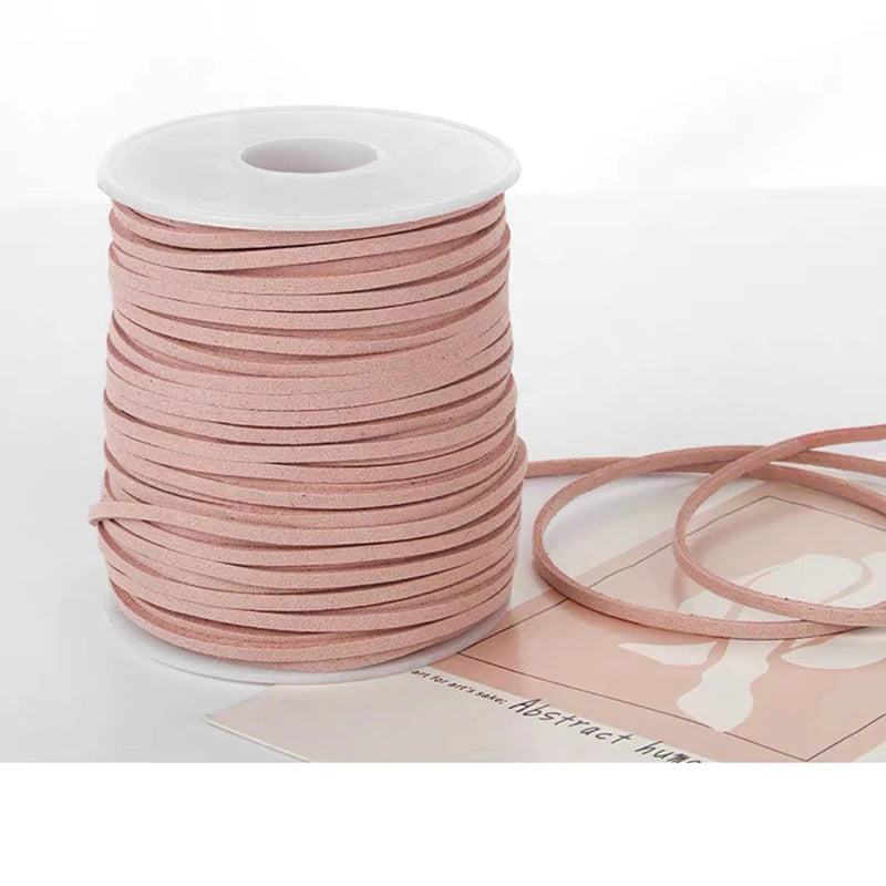 Roll of pink velvet faux suede braided ribbon for crafting and gift wrapping