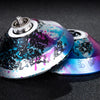 A professional aluminum alloy yo-yo with a high-speed ball bearing, featuring a vibrant blue and purple speckled finish.