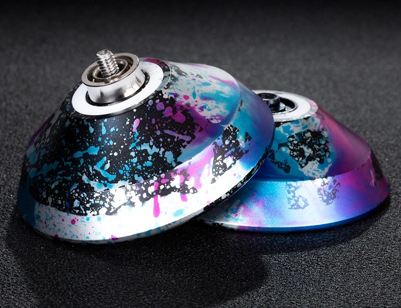 A professional aluminum alloy yo-yo with a high-speed ball bearing, featuring a vibrant blue and purple speckled finish.