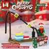 A set of Christmas gift lanterns made from wooden building blocks with a festive background.