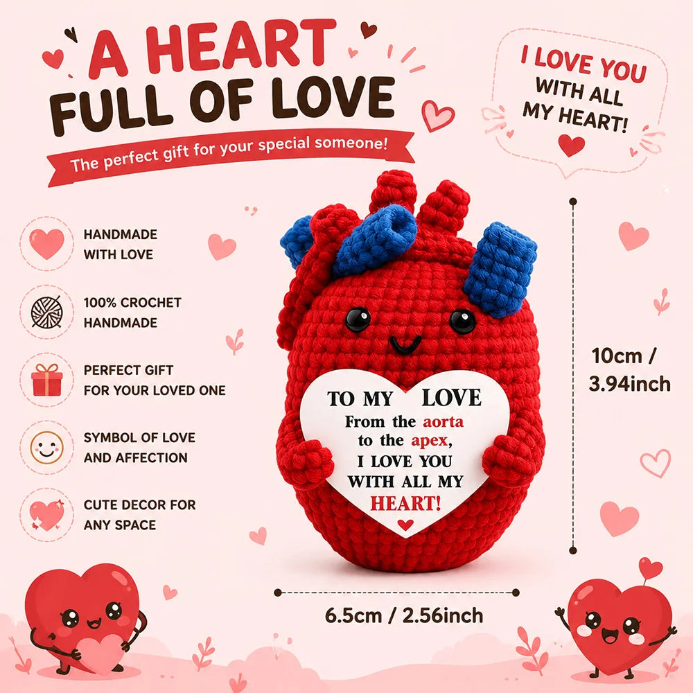 A handmade red crochet heart shaped doll with a motivational card for a special someone