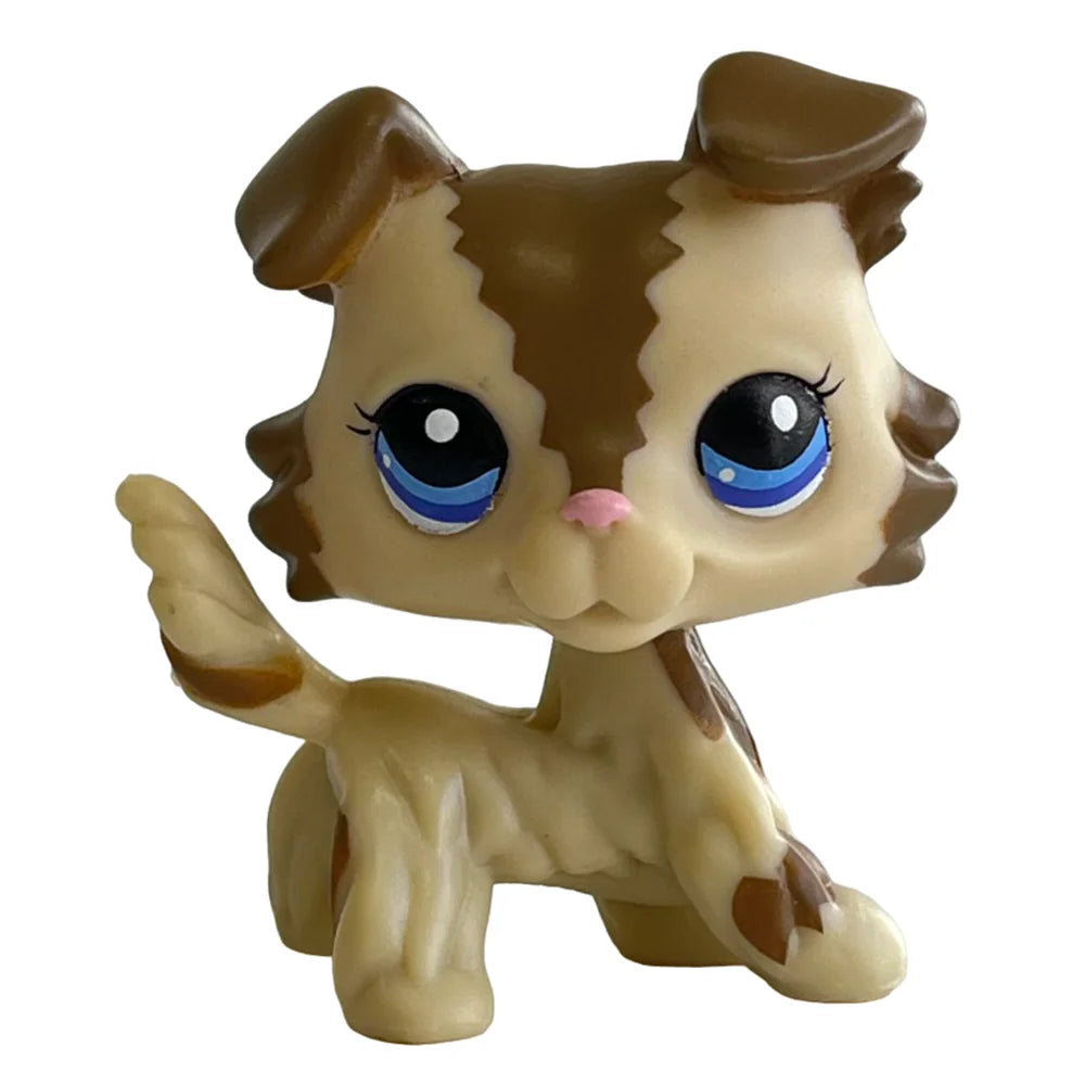 Sammler-Katzenfigur mit braunem und gelblichem Fell und großen blauen Augen.