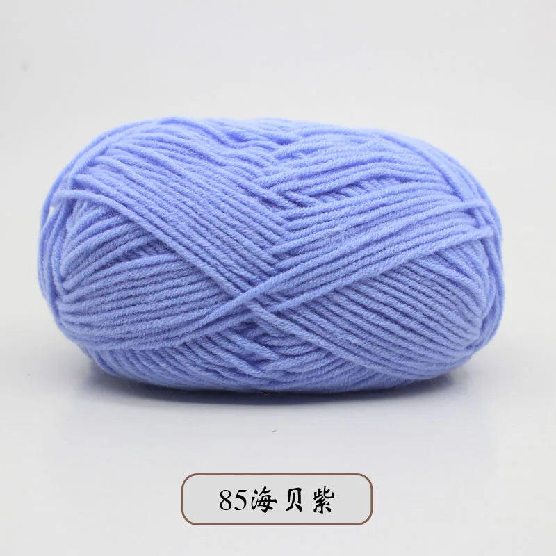 A ball of light blue pre-dyed milk cotton yarn used for knitting and crochet.