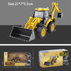 A yellow die-cast toy excavator construction vehicle with a black bucket and a box packaging.