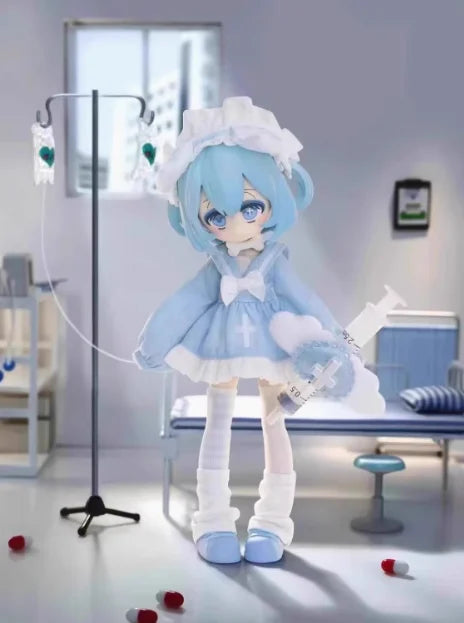An articulated vinyl art figure of a blue-haired anime character with white clothing and a light blue dress.