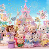 A collection of Sylvanian Families figures, including a deer family set and various animal characters, displayed in a colorfu