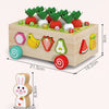 A wooden shape-matching toy featuring various vegetable shapes like radishes, peppers, and fruits arranged in a tray.