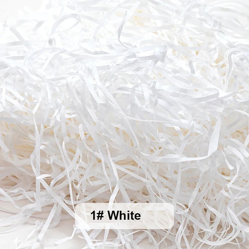 White raffia paper shreds used for gift boxes and baskets