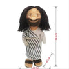 A plush doll set of Jesus and Virgin Mary with dark hair, a smiling face, and striped clothing.