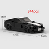 A black and white classic supercar model built from 344 Lego pieces.