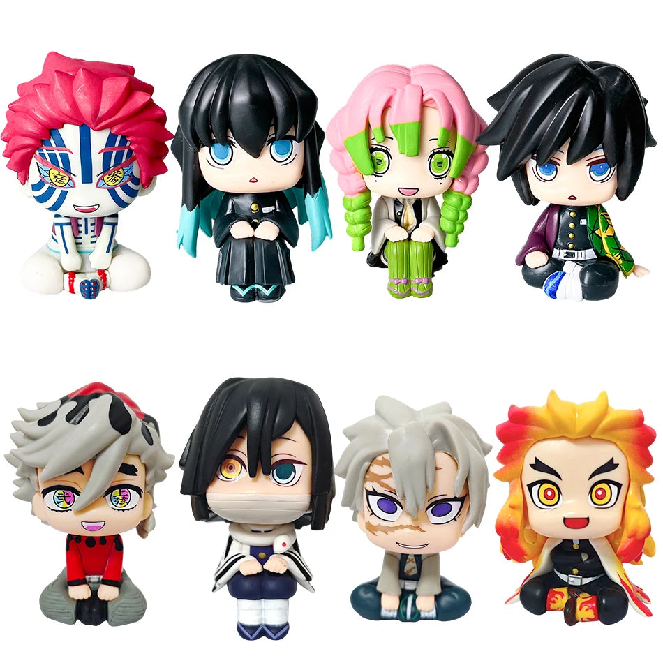 A set of four Demon Slayer anime action figures featuring characters like Tanjirou, Nezuko, Giyuu, and Mitsuri.