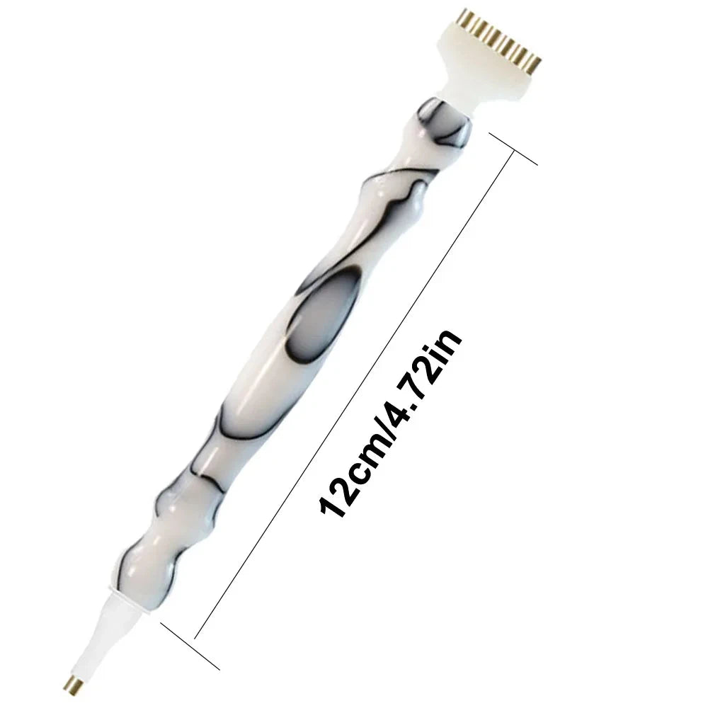 A white diamond painting pen set with an interchangeable tip shown diagonally against a white background.